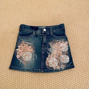 Girls denim skirt size 4 with pink designs
